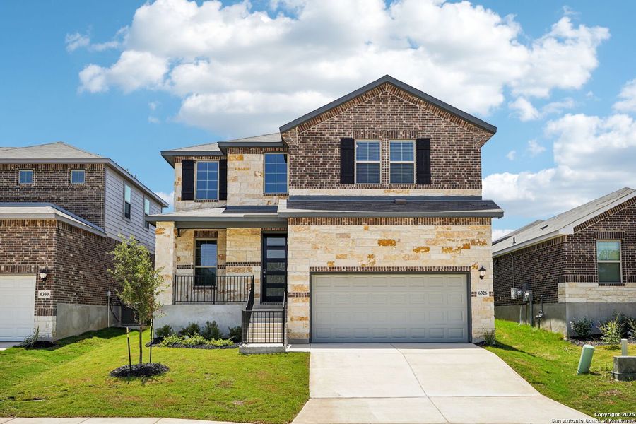 Front exterior of a new home in Comanche Ridge, San Antonio, TX, highlighting curb appeal (Image 29). Front exterior of a new home in Comanche Ridge, San Antonio, TX, highlighting curb appeal (Image 29).