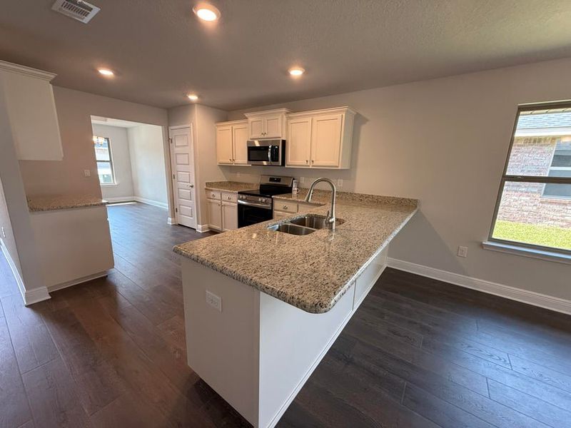 Furnished interior view inside a new home in Ridgeway Landing, Crestview (Image 4).