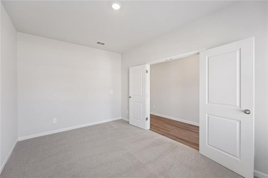 Spacious, unfurnished interior of a new home in Creekside at Oxford Park, Fairburn (Image 30).