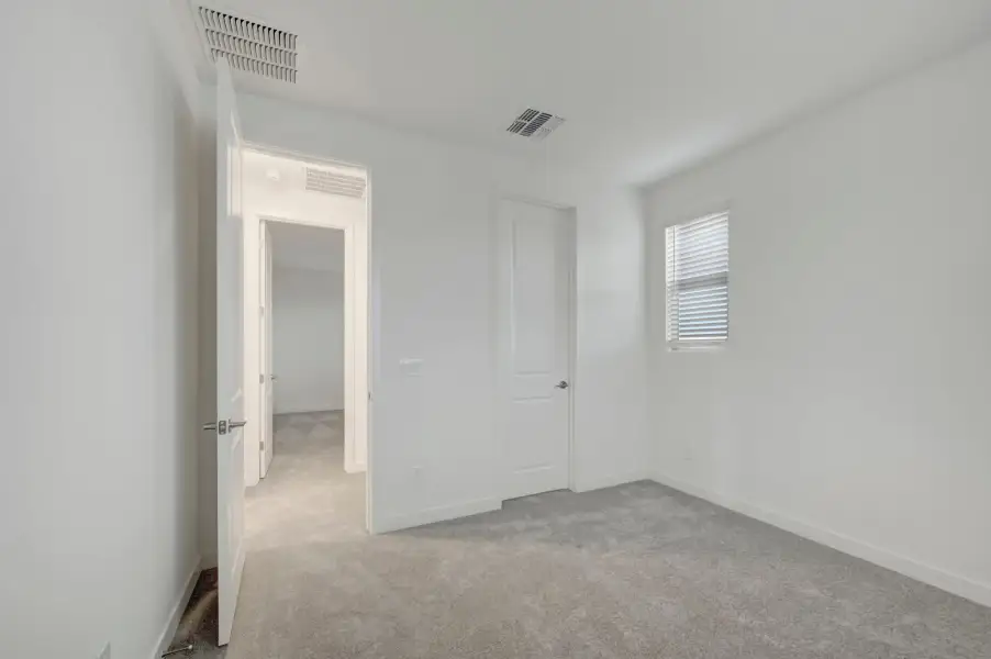 Spacious, unfurnished interior of a new home in Soleo, San Tan Valley (Image 29).