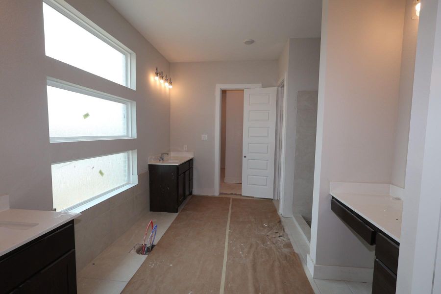 In-progress construction of a new home in Dunham Pointe, Cypress, TX (Image 28).