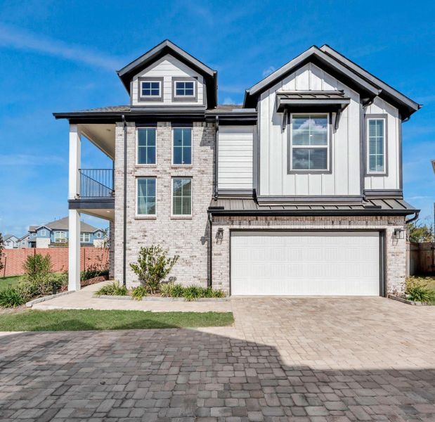Front exterior of a new home in Sienna, Missouri City, TX, highlighting curb appeal (Image 18).