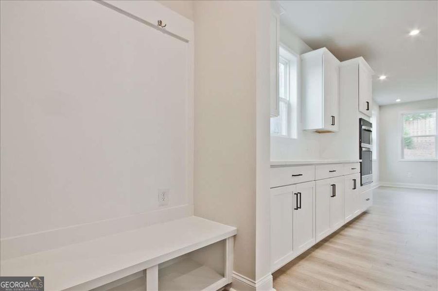Furnished interior view inside a new home in The Paddocks at Doc Hughes, Buford (Image 6).