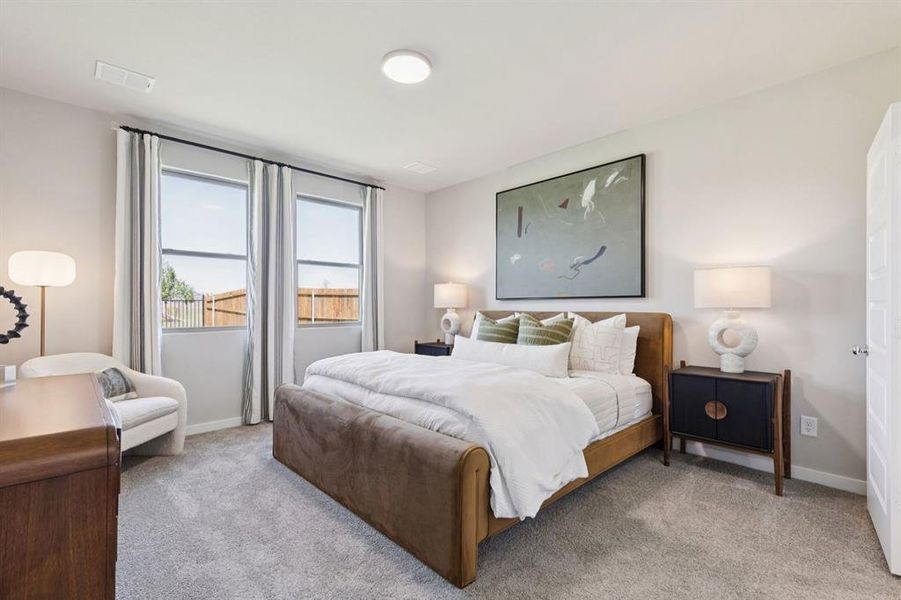 Primary Suite in the Magnolia home plan by Trophy Signature Homes – REPRESENTATIVE PHOTO