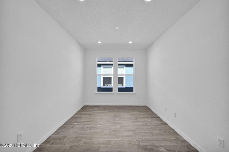 Spacious, unfurnished interior of a new home in Del Webb Wildlight, Yulee (Image 22).