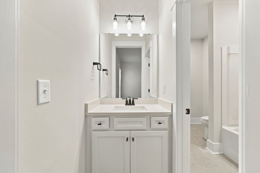 Furnished interior view inside a new home in Indigo Bay, Myrtle Beach (Image 12).