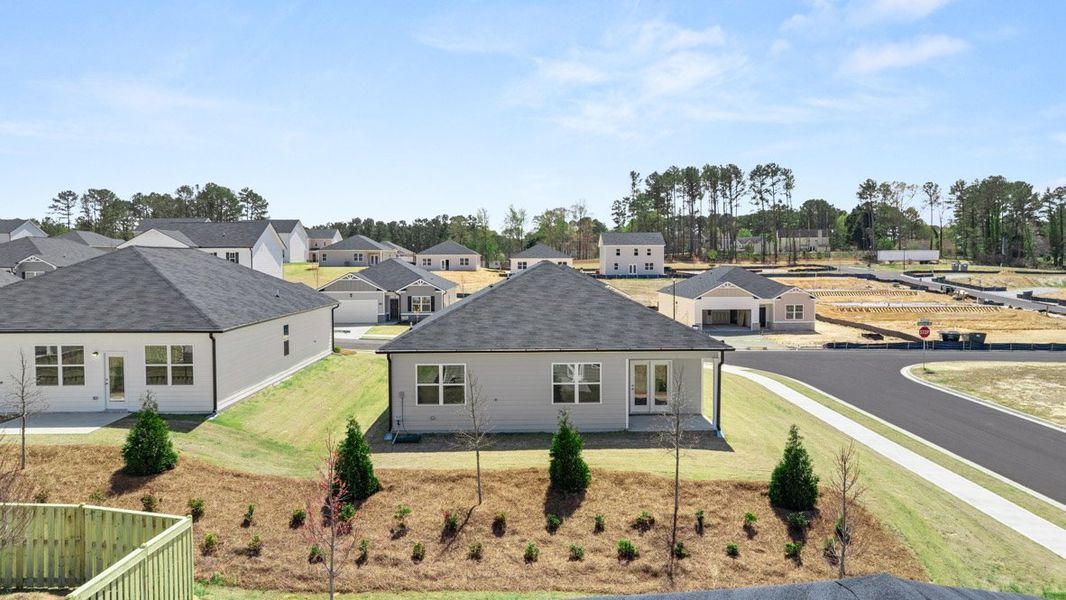 Front exterior of a new home in The Preserve at Agricultural Village, Perry, GA, highlighting curb appeal (Image 17).