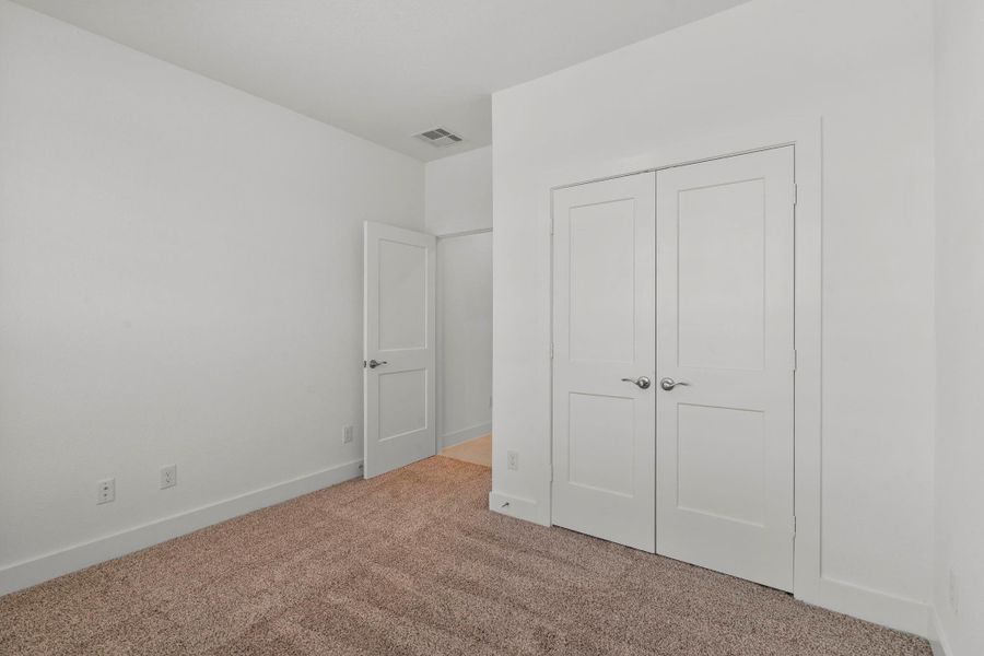 Spacious, unfurnished interior of a new home in Meridiana, Iowa Colony (Image 13).