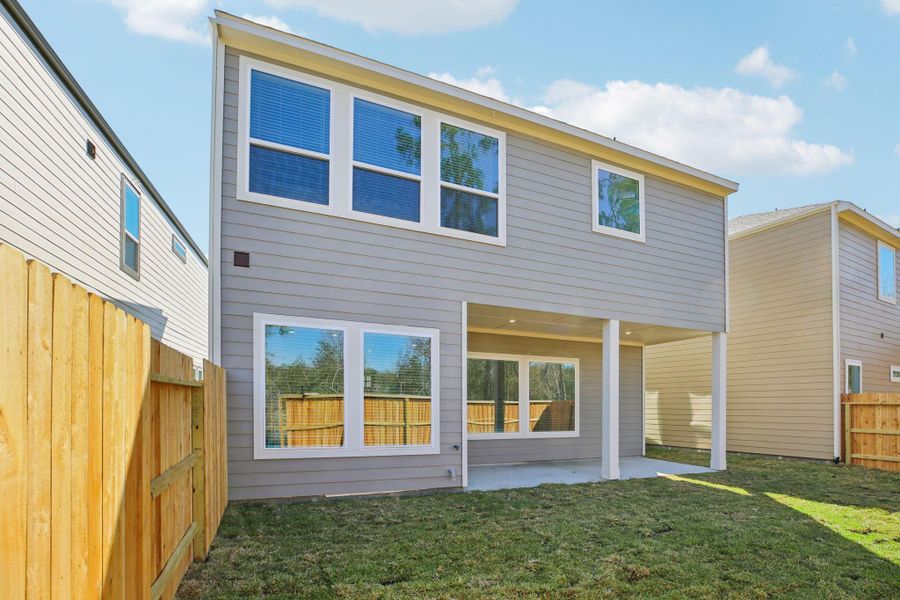 Exterior details and patio area of a home in Pinewood Trails - Luxe Series, Houston (Image 3).