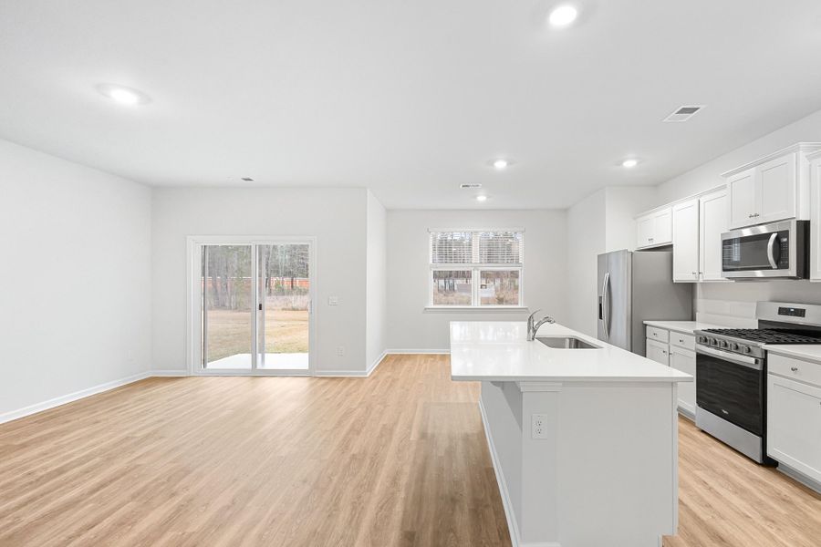 Furnished interior view inside a new home in The Cove at Mallard Crossing, Summerville (Image 6). Furnished interior view inside a new home in The Cove at Mallard Crossing, Summerville (Image 6).