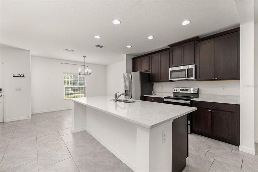Furnished interior view inside a new home in , Davenport (Image 6).