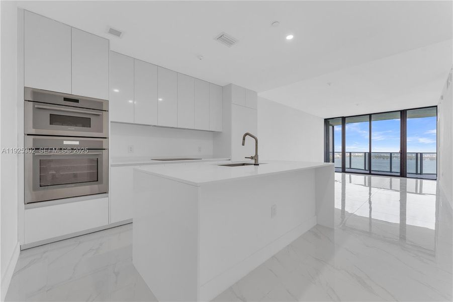 Furnished interior view inside a new home in Aria Reserve, Miami (Image 7).