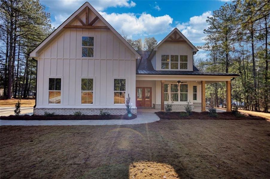 Front exterior of a new home in , Mansfield, GA, highlighting curb appeal (Image 31). Front exterior of a new home in , Mansfield, GA, highlighting curb appeal (Image 31).