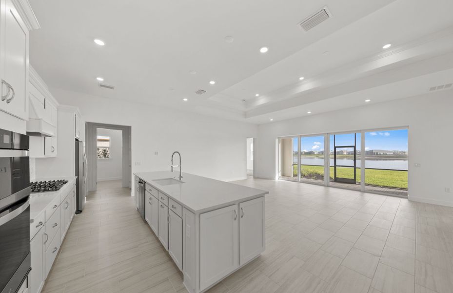 Furnished interior view inside a new home in TerraWalk at Babcock Ranch, Alva (Image 8).