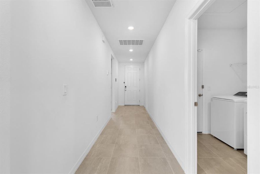 Spacious, unfurnished interior of a new home in Lawson Dunes - Signature Series, Haines City (Image 18).