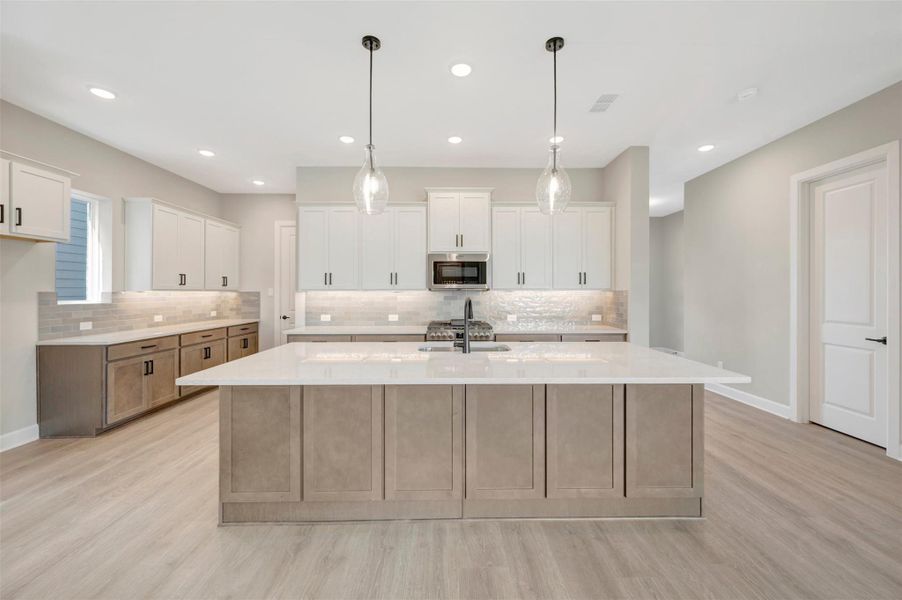 Furnished interior view inside a new home in Pomona - Grove Row Collection, Manvel (Image 7).