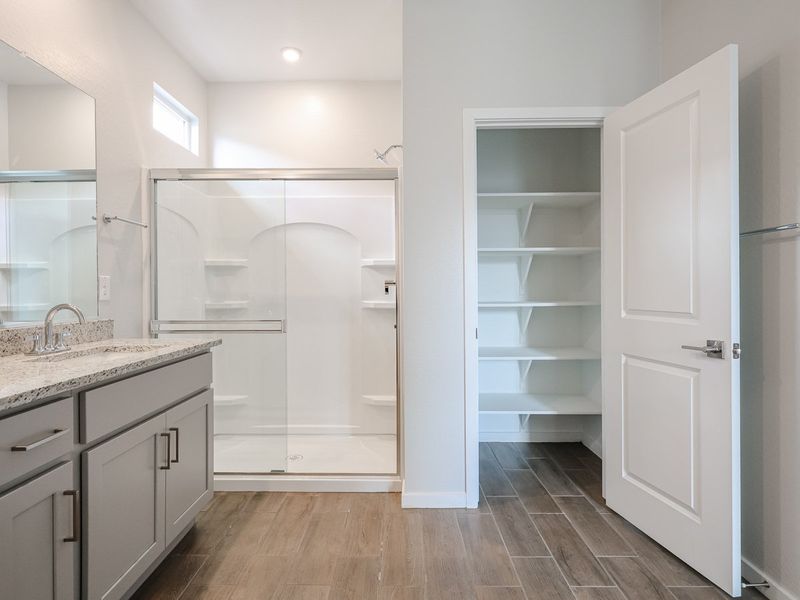 A bathroom with a glass shower.