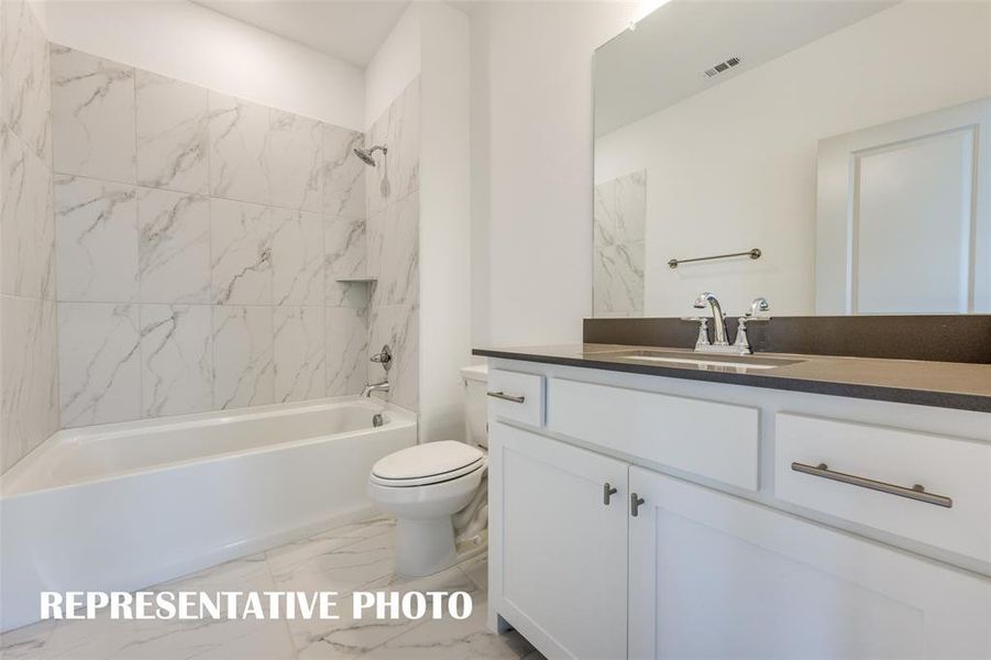 Guests will feel right at home in this beautifully finished guest bath.  REPRESENTATIVE PHOTO.