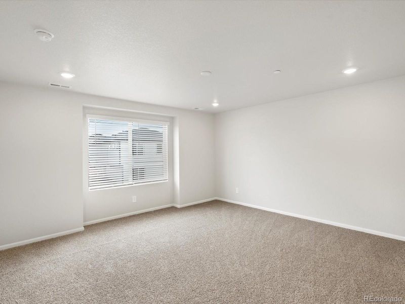 Spacious, unfurnished interior of a new home in Buffalo Highlands: The Flora Collection, Commerce City (Image 13).