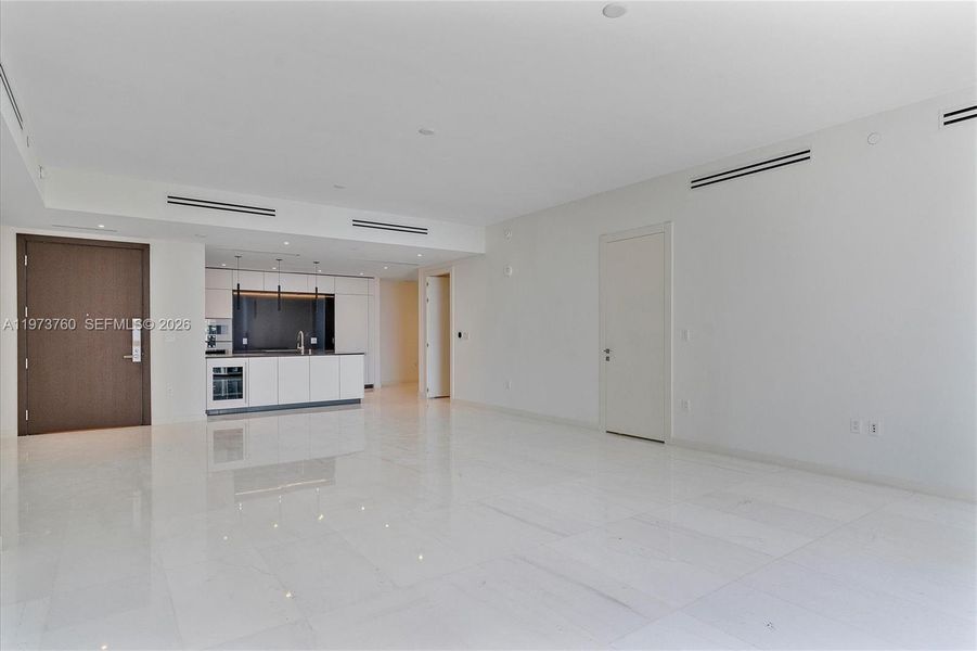 Spacious, unfurnished interior of a new home in Aston Martin Residences, Miami (Image 49).
