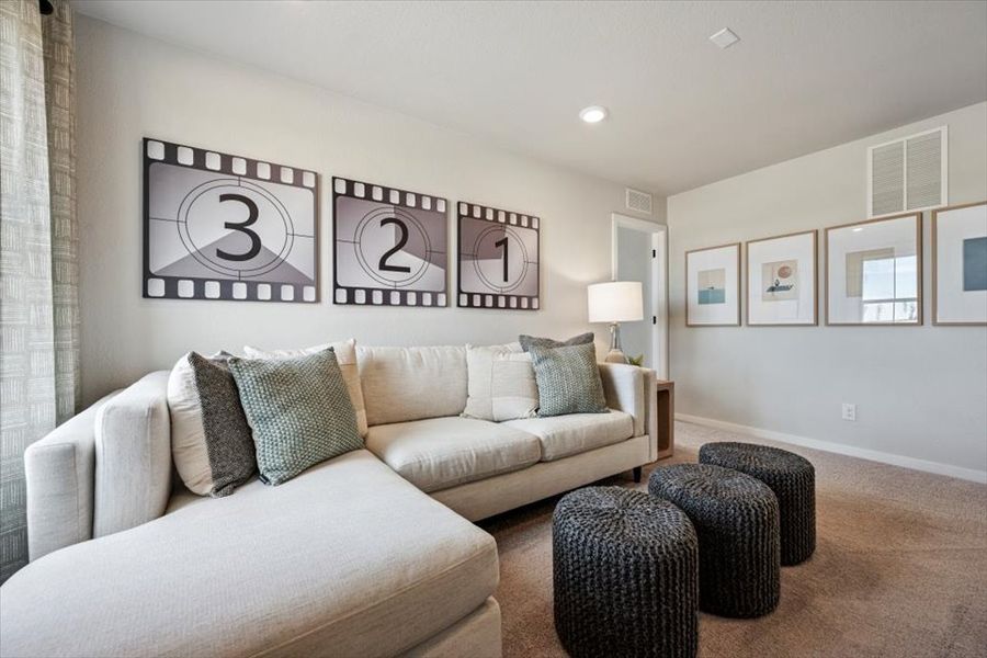 A living room with a couch and a coffee table.