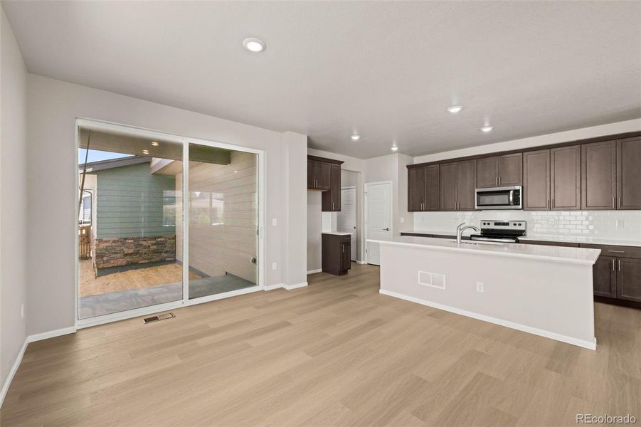 Furnished interior view inside a new home in Painted Prairie, Aurora (Image 17).