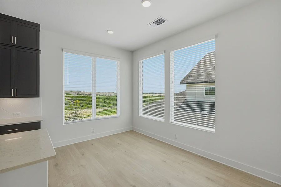 Representative unfurnished interior of a home built from the Athena by Chesmar Homes in Prominence Urban, San Antonio (Image 18).
