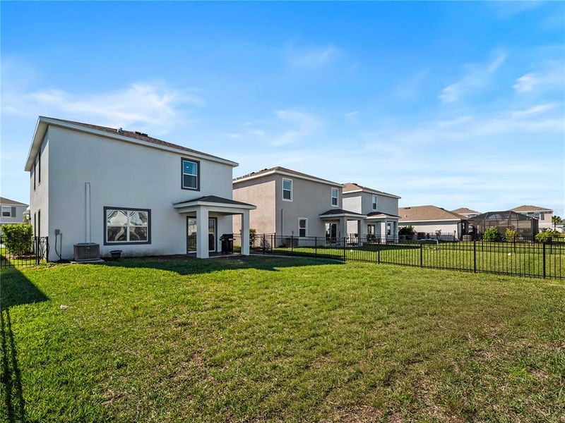 Exterior details and patio area of a home in Star Farms at Lakewood Ranch, Bradenton (Image 3).