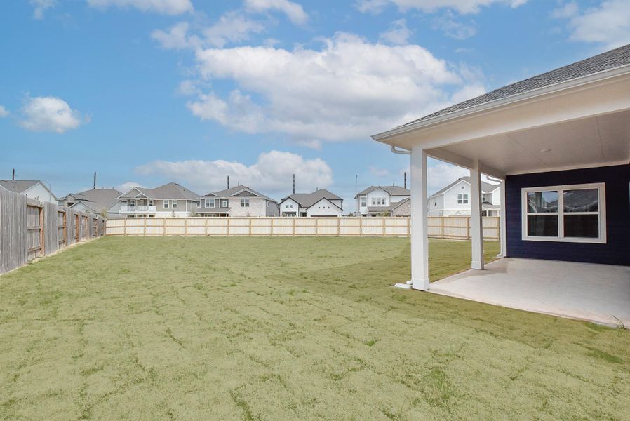 Exterior details and patio area of a home in Fulshear Lakes, Fulshear (Image 24).