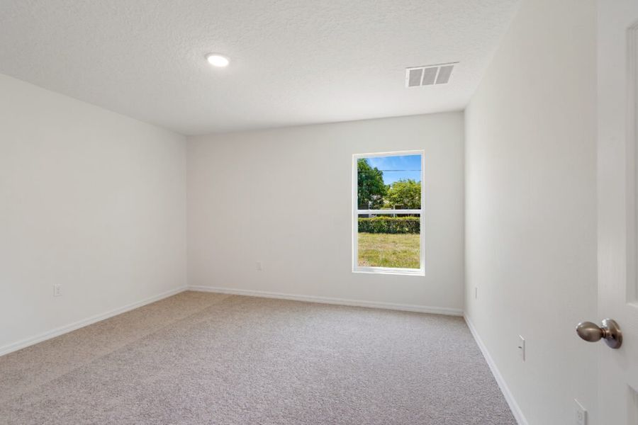 Representative unfurnished interior of a home built from the Foxtail by Holiday Builders in Port St Lucie, Port St. Lucie (Image 10).