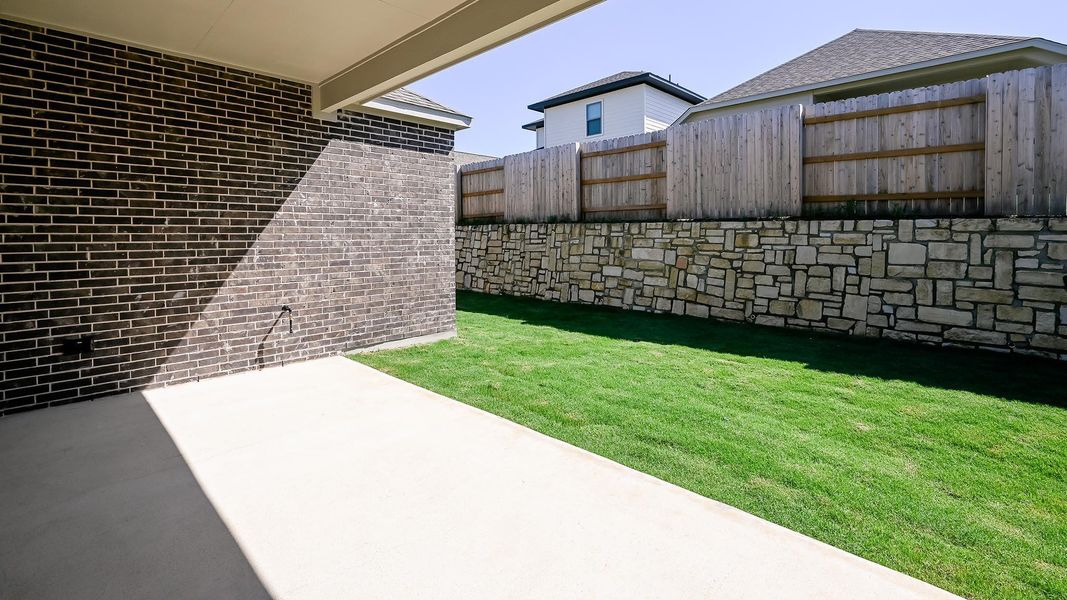 Exterior details and patio area of a home in Crosswinds, Kyle (Image 4). Exterior details and patio area of a home in Crosswinds, Kyle (Image 4).