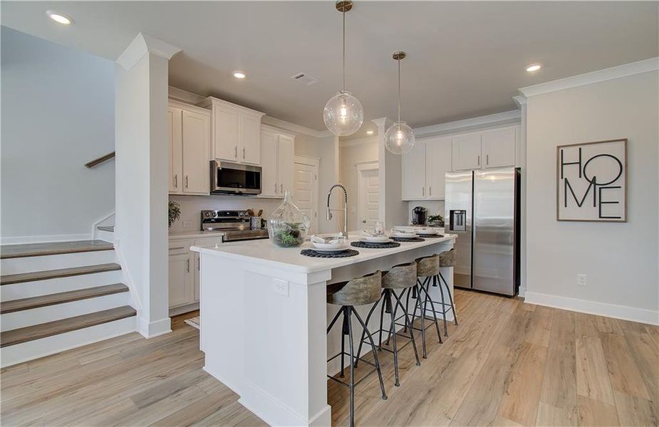 Furnished interior view inside a new home in The Towns at Auburn Station East, Auburn (Image 5).