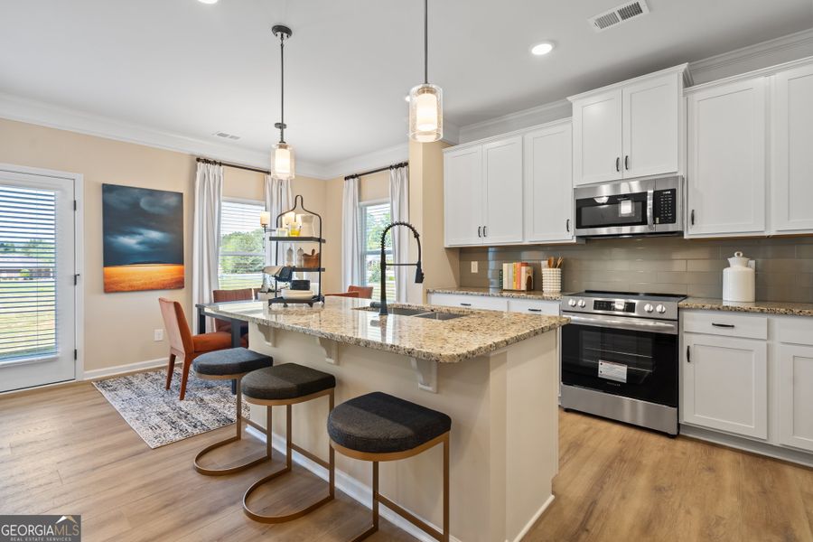 Furnished interior view inside a new home in Crescent Towns, Riverdale (Image 6).