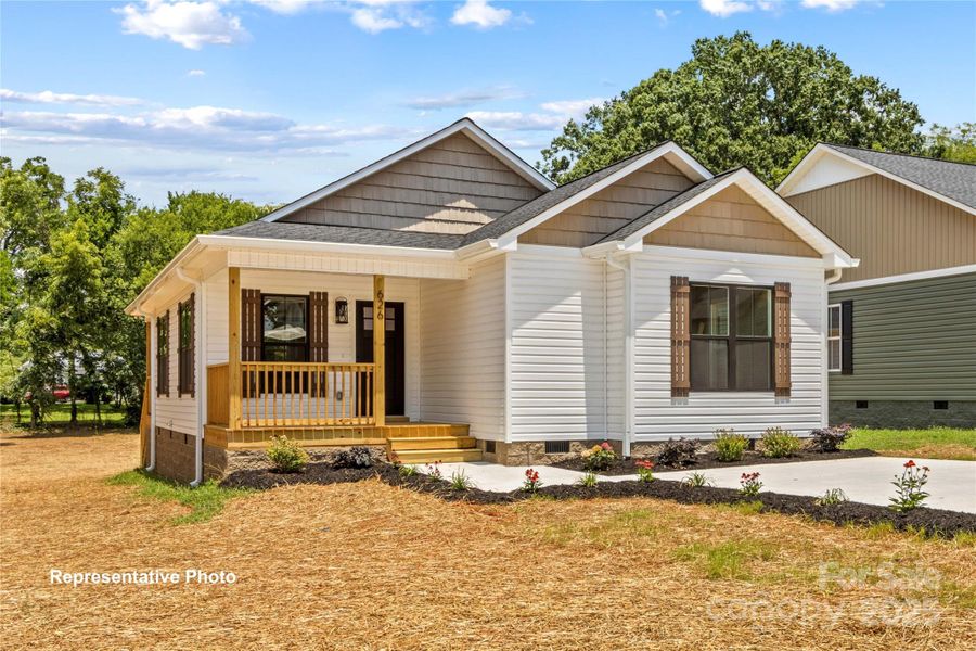 Front exterior of a new home in , Statesville, NC, highlighting curb appeal (Image 15).