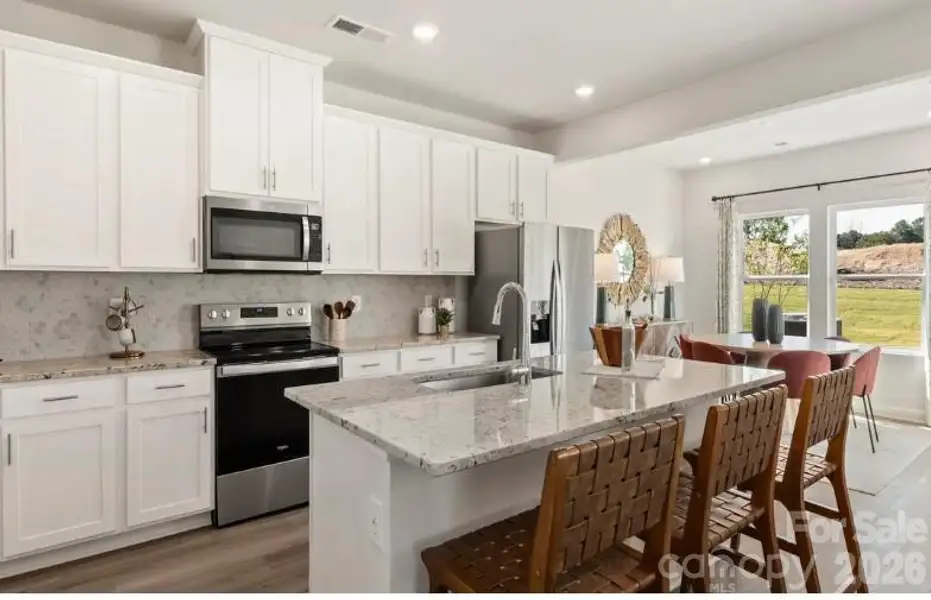 Photo is not of the actual home, but is an inspirational photo of builder’s model home and may depict options, furnishings, and/or decorator features that are not included