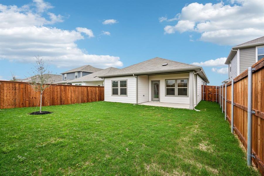 Exterior details and patio area of a home in Lakehaven - Spring Series, Farmersville (Image 3).