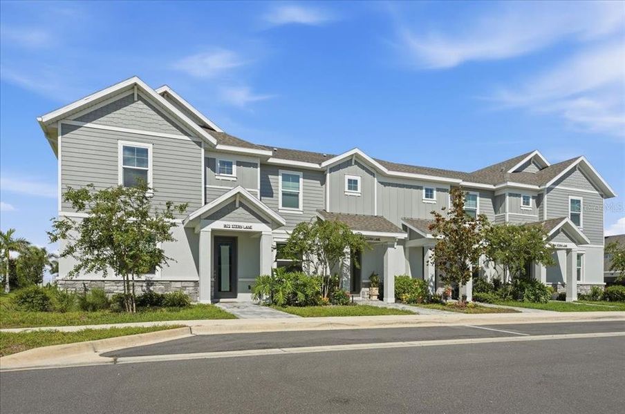 Front exterior of a new home in , Sarasota, FL, highlighting curb appeal (Image 29).