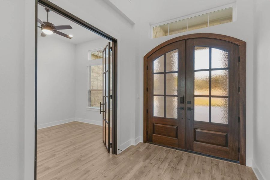 Representative unfurnished interior of a home built from the Merritt by Chesmar Homes in Feathergrass, Fulshear (Image 8).
