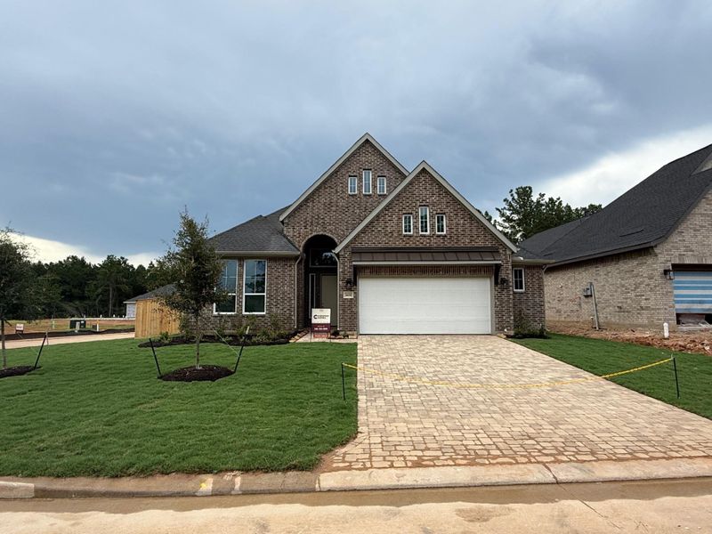 Front exterior of a new home in Kresston, Montgomery, TX, highlighting curb appeal (Image 2).