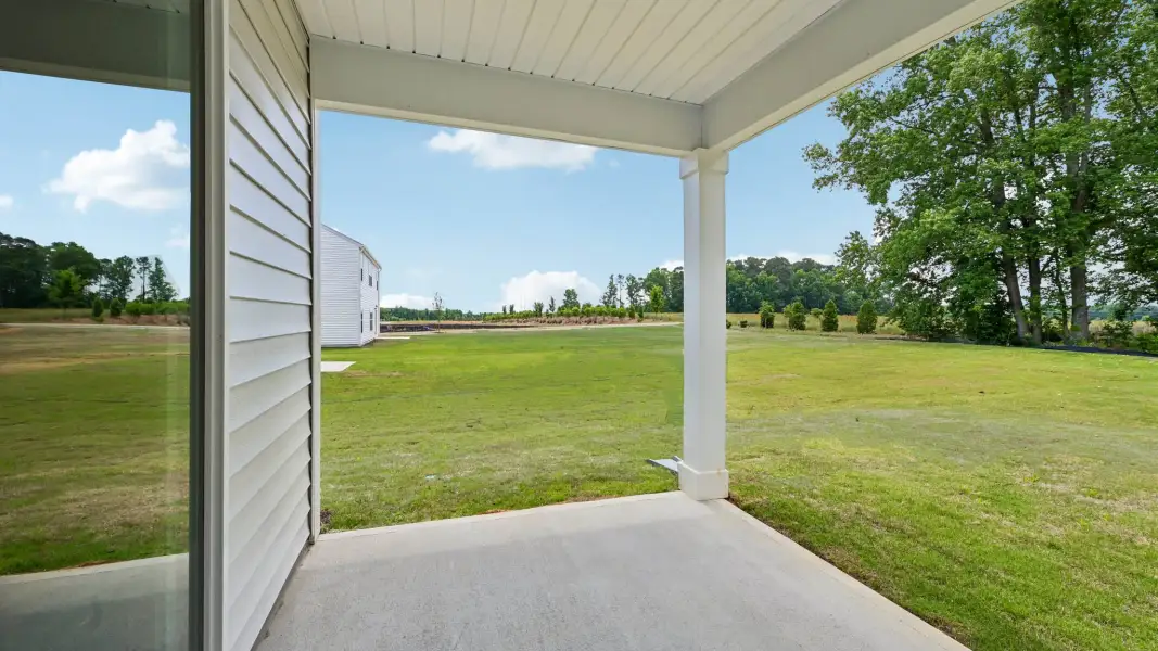 Exterior details and patio area of a home in Wilson's Ridge, Wilson's Mills (Image 20).