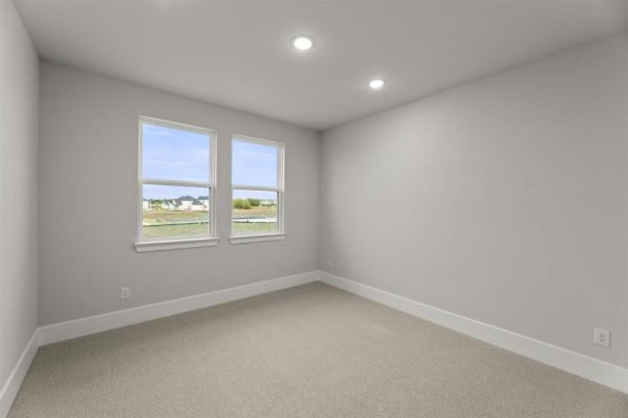 Representative unfurnished interior of a home built from the Tahiti by Stonefield Homes in Heath Golf and Yacht Club, Rockwall (Image 26).