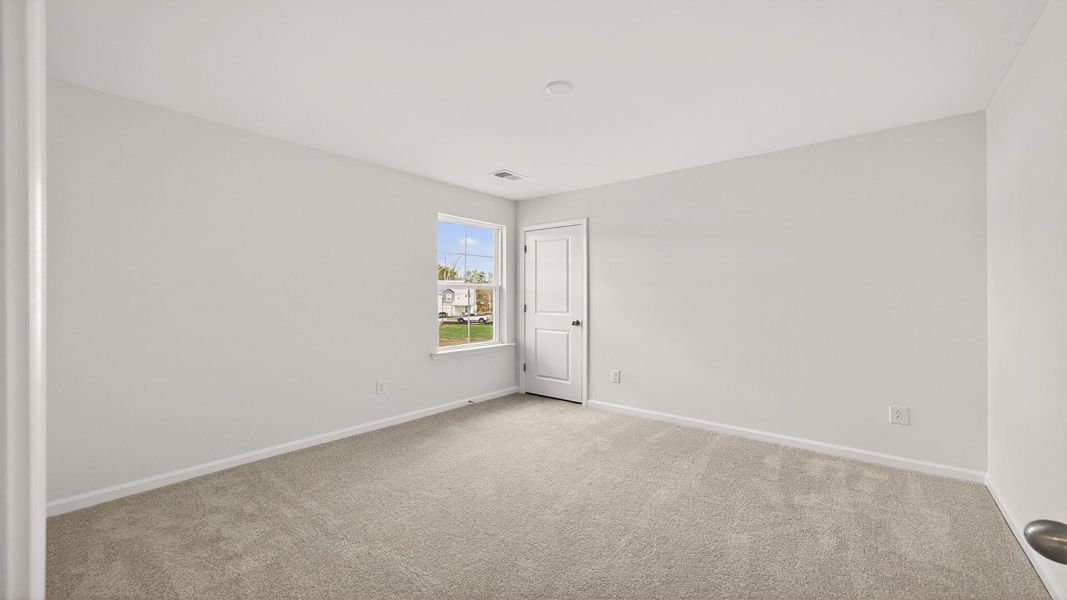 Spacious, unfurnished interior of a new home in Creekside at Andrews, Summerville (Image 22).