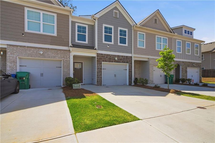 Front exterior of a new home in , Lithonia, GA, highlighting curb appeal (Image 2). Front exterior of a new home in , Lithonia, GA, highlighting curb appeal (Image 2).