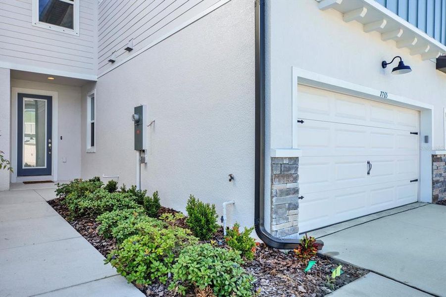 Exterior details and patio area of a home in The Towns At Long Bayou, Seminole (Image 3). Exterior details and patio area of a home in The Towns At Long Bayou, Seminole (Image 3).