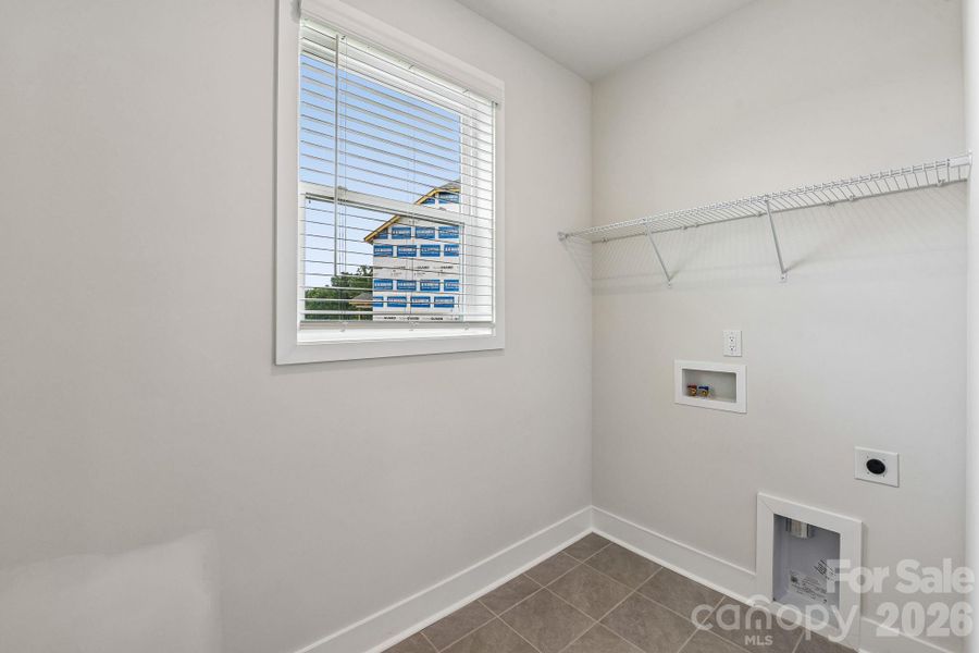 Spacious, unfurnished interior of a new home in Sanctuary at Southgate, Indian Trail (Image 15).