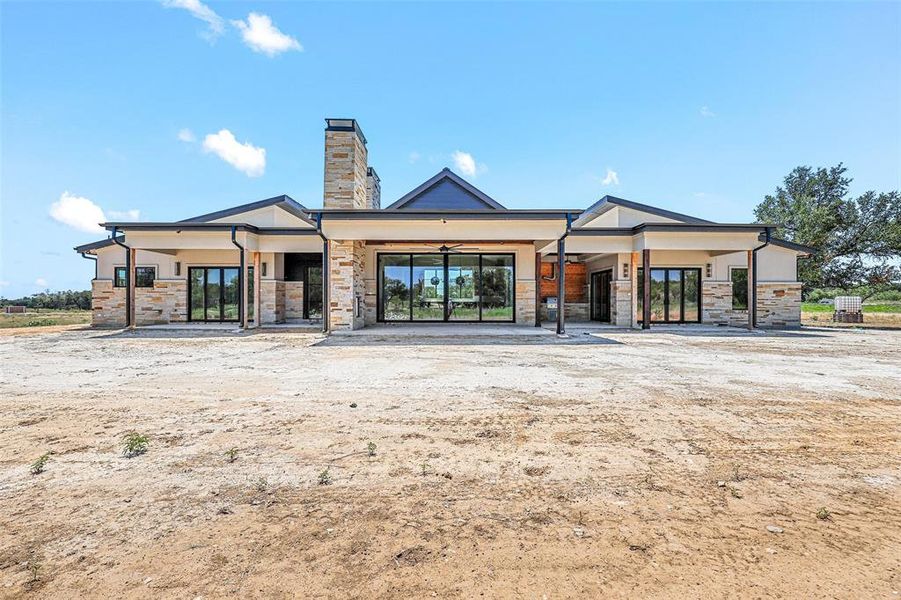 Front exterior of a new home in , Strawn, TX, highlighting curb appeal (Image 20). Front exterior of a new home in , Strawn, TX, highlighting curb appeal (Image 20).