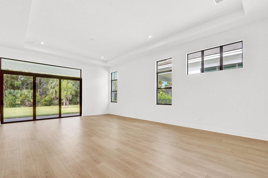 Spacious, unfurnished interior of a new home in Cove Royale, Stuart (Image 33).