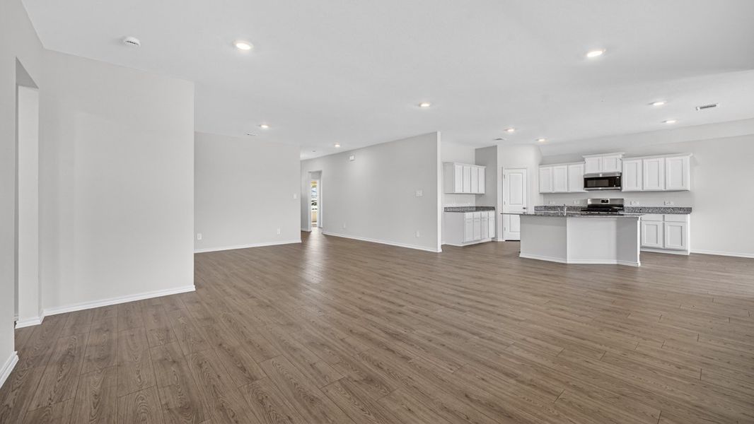 Representative unfurnished interior of a home built from the Fiedor by D.R. Horton in Windrose, Pilot Point (Image 8). Representative unfurnished interior of a home built from the Fiedor by D.R. Horton in Windrose, Pilot Point (Image 8).