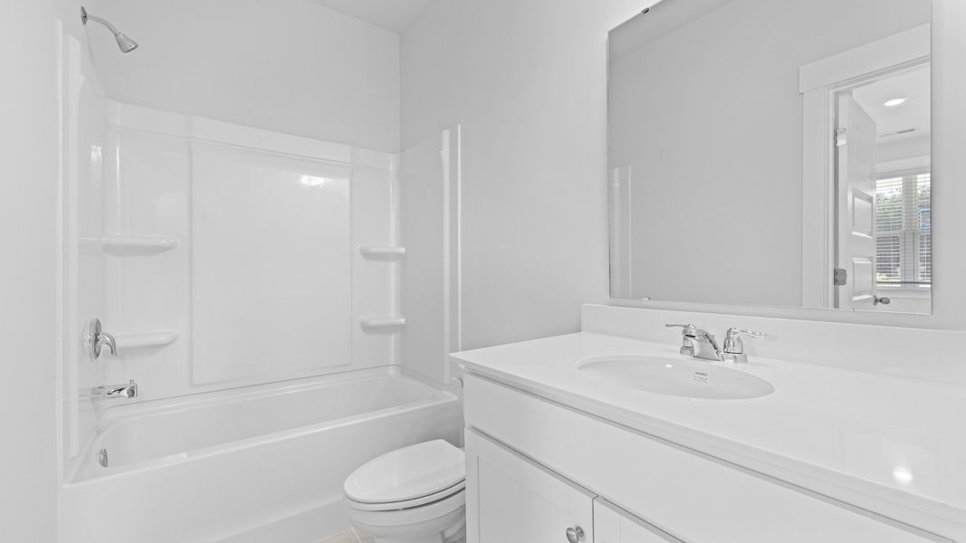 Representative furnished interior of a home built from the SPRUCEWOOD by D.R. Horton in Sheep Island, Summerville (Image 10).