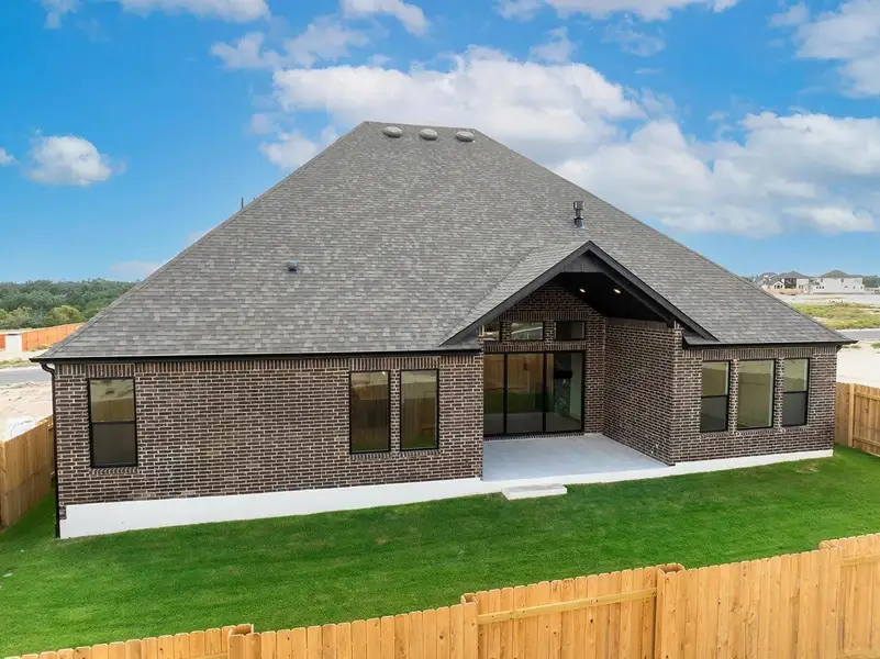 Exterior details and patio area of a home in Lariat - 70', Liberty Hill (Image 3).